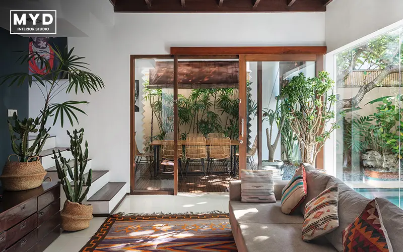 Renovated living area with indoor-outdoor design.