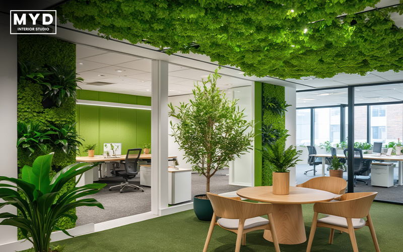 Biophilic design office space with plants and green accents.